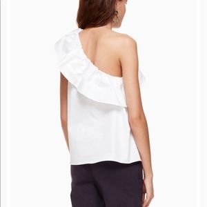 One shoulder top. Elastic neckline, machine wash